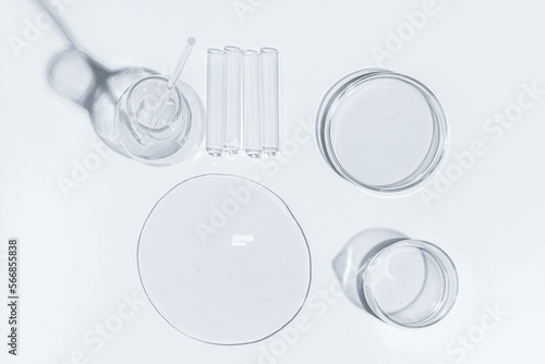 Petri dish, gel, flask, crystallization bowl. Test tubes, Laboratory. View from above. Medicine, gel texture, white, pipette, samples, research. Material collection. Glass baguette.