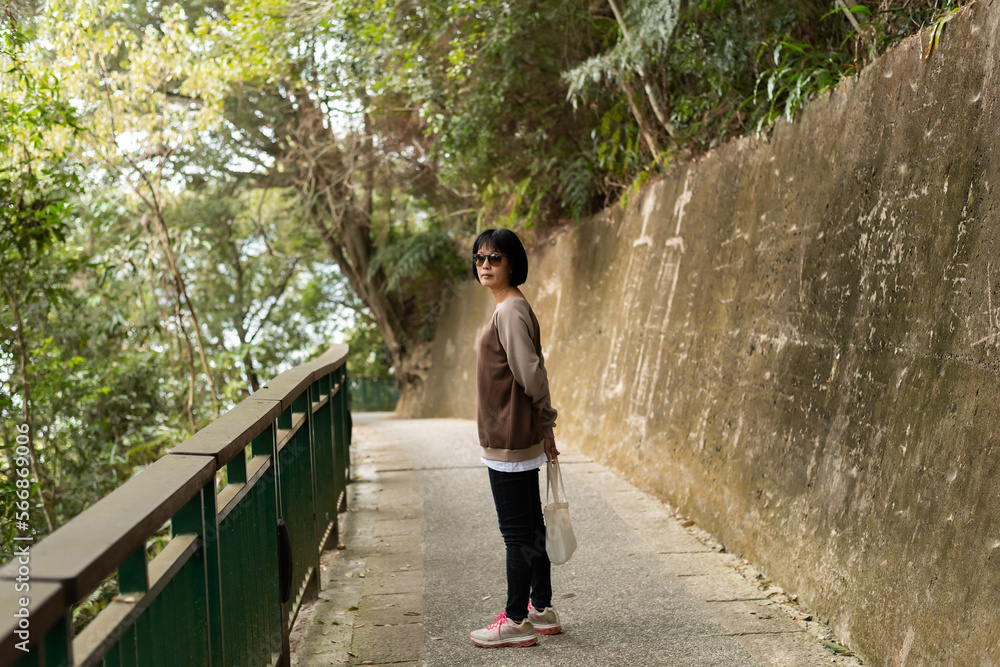 Asian woman hiking