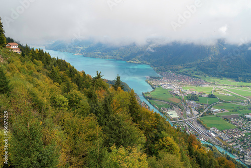 Autumn view from the forest above Interlaken  with building perched high on the mountain