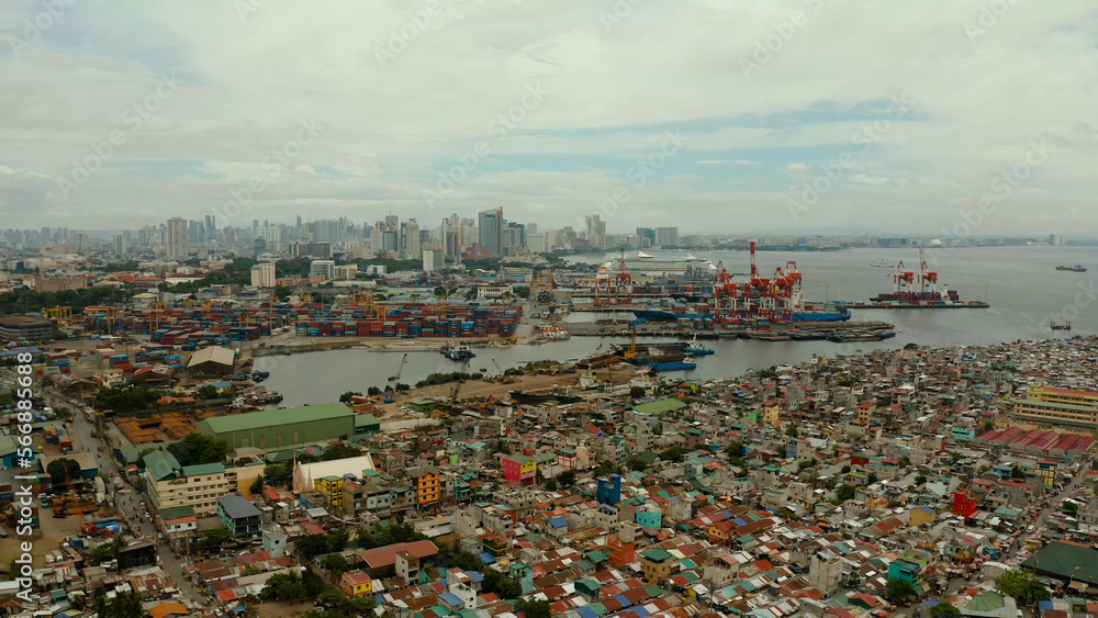Obraz premium Manila city with port, skyscrapers, modern buildings and Makati business center aerial drone. Travel vacation concept