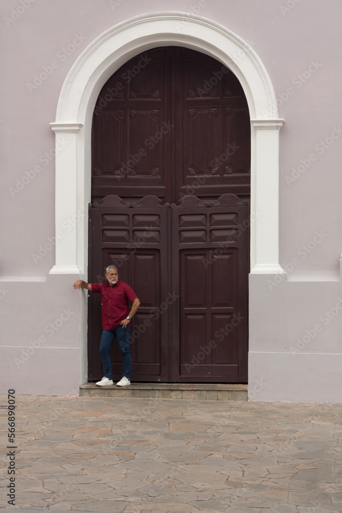 mature man in doorway