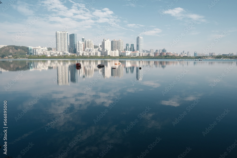 Urban landscape reflection on the lake