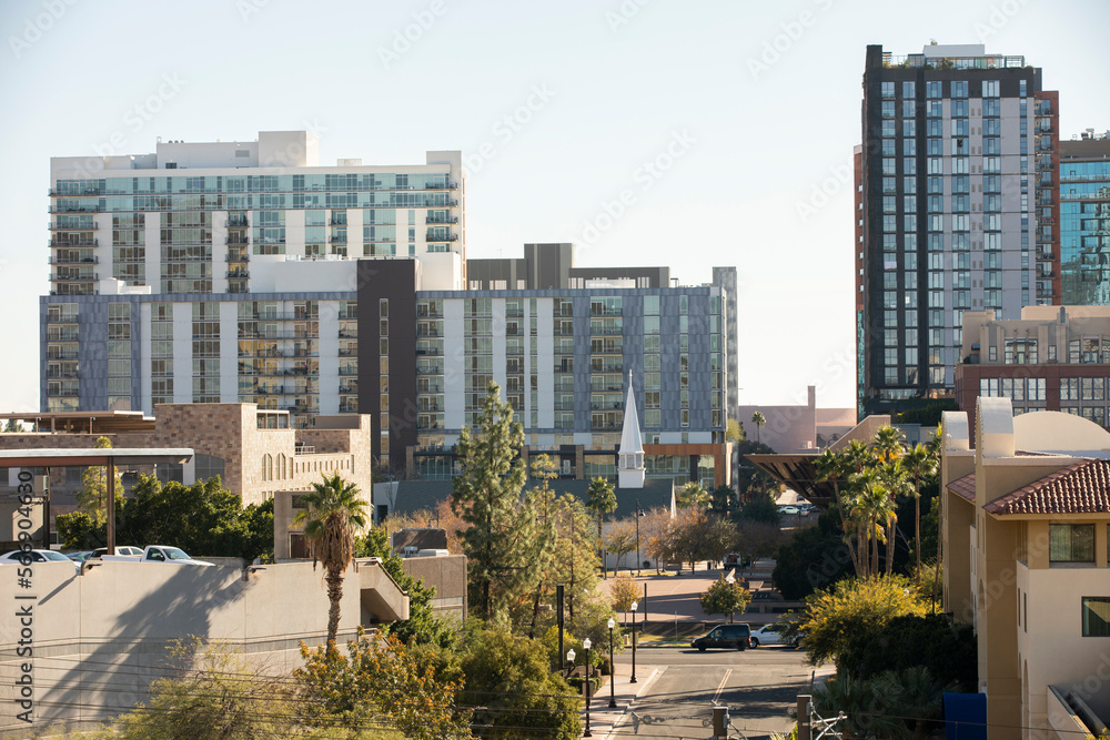 Fototapeta premium Afternoon sun shines on the urban skyline of downtown Tempe, Arizona, USA.