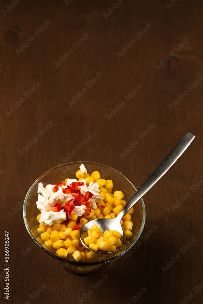 Esquites with corn, cheese, mayonnaise and chili. Mexican street food. Top view Esquites with corn, cheese, mayonnaise and chili. Mexican street food. Top view