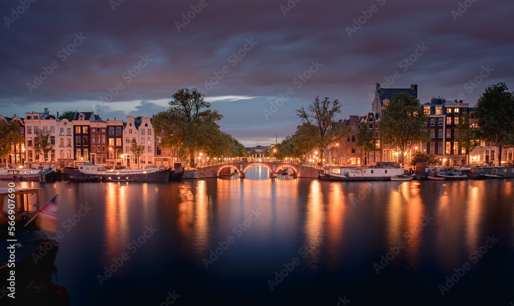 Amsterdam Canals with bridge and dutch houses, Netherlands