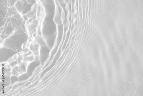 Fotografia Abstract white transparent water shadow surface texture natural ripple backgroun