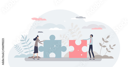 Business partners teamwork with two jigsaw puzzle pieces tiny person concept, transparent background. Mutual cooperation, collaboration and partnership strategy to unite company.