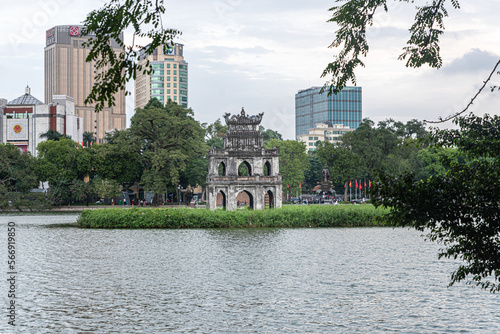 Streets of Hanoi in a cloudy day, people, transportation and food around this beautiful city.
