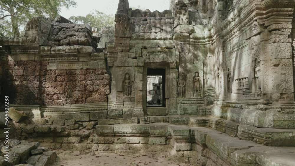 The Khmer temple of Ta Som - Ruins of a 12th century Buddhist temple, with intricate carvings The Khmer temple of Ta Som - Ruins of a 12th century Buddhist temple, with intricate carvings