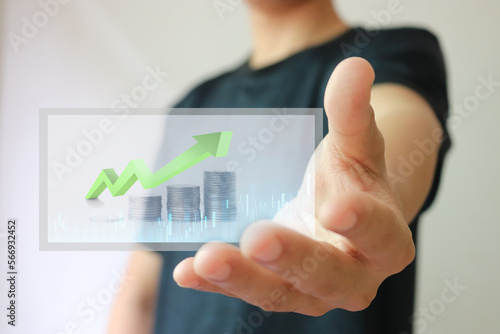 Planning and strategy, Coins for finance. Concept of economy and financial growth by investment in valuable asset to gain cash revenue. Trader is showing growing virtual hologram stock.