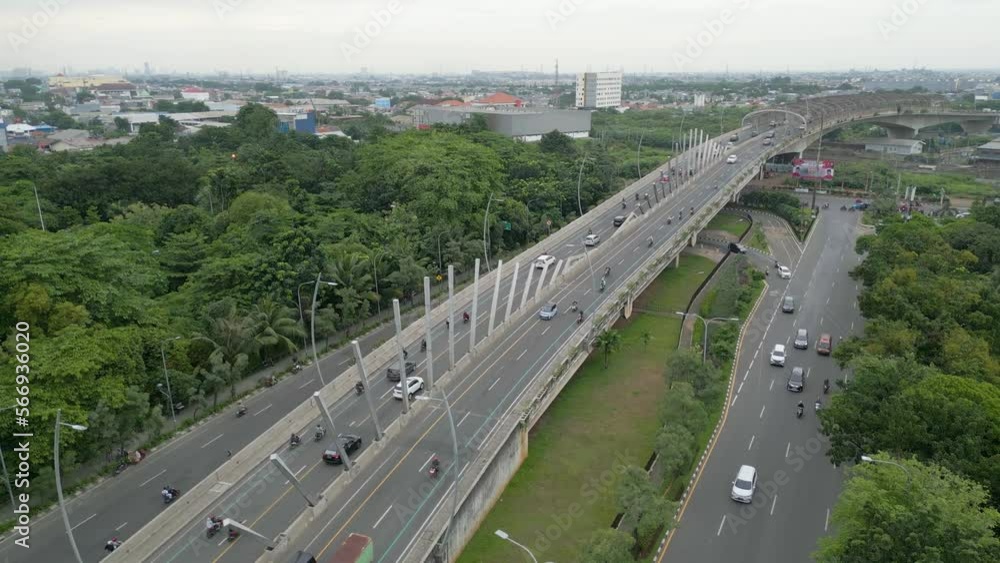 Aerial view of the traffic on the summarecon bridge in Bekasi City Aerial view of the traffic on the summarecon bridge in Bekasi City