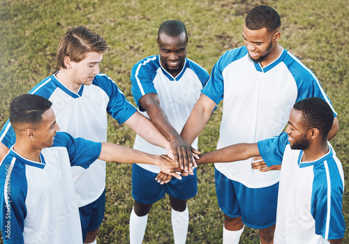 Soccer, team and hands of men in support of sports, collaboration and game strategy at a field. Football, players and man group with hand huddle for fitness, motivation and training goal outdoors © C. D./peopleimages.com
