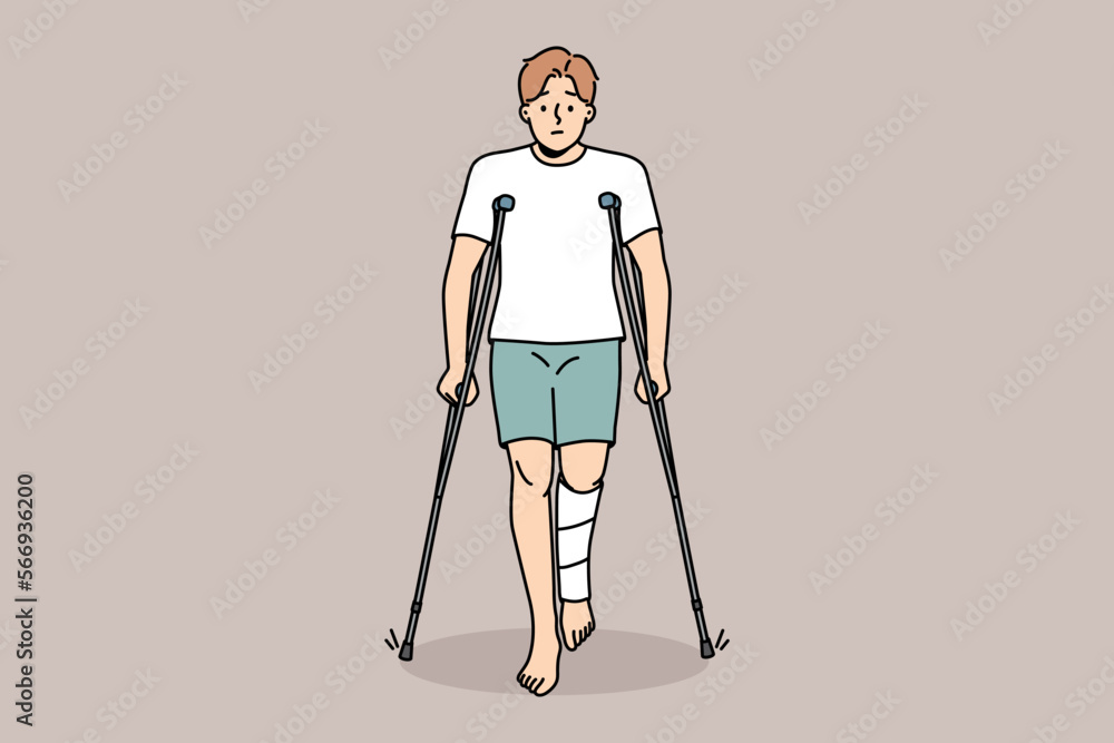 Unhappy young man with leg injury walking on crutches. Upset injured male with limb trauma suffer walking or standing. Healthcare and recovery. Vector illustration. Unhappy young man with leg injury walking on crutches. Upset injured male with limb trauma suffer walking or standing. Healthcare and recovery. Vector illustration.