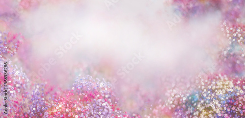 Multicolored gypsophila flowers on a light background. Spring banner, postcard