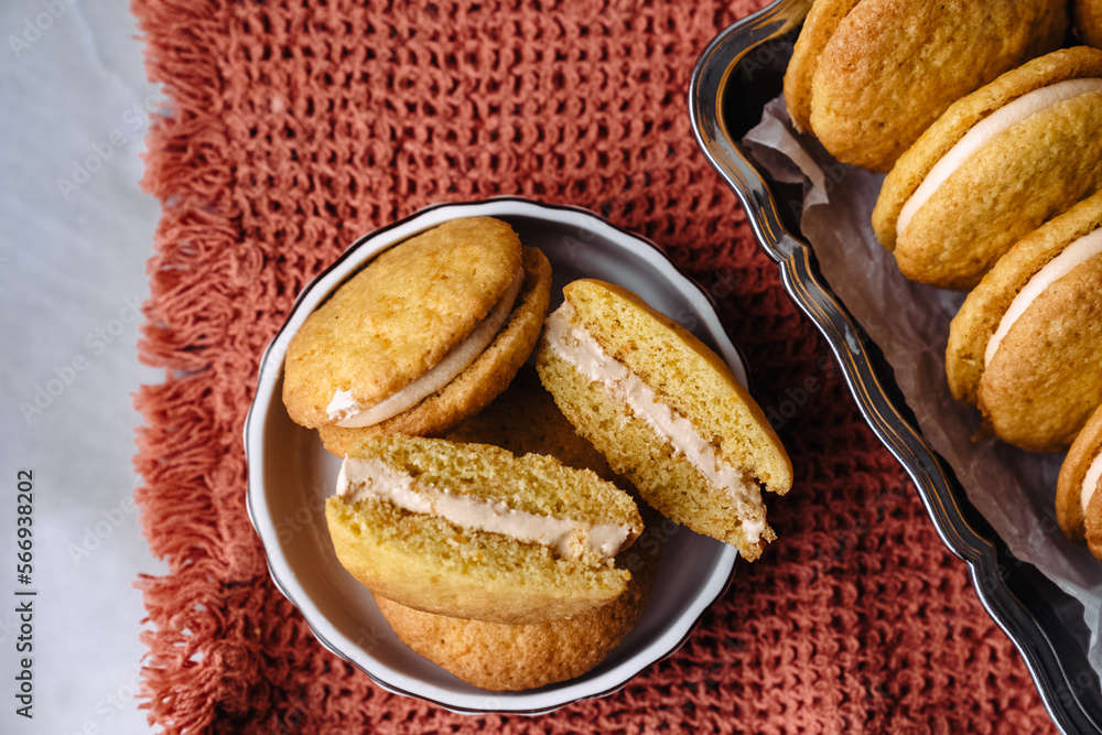 dessert cookies whoopie with cream carrot pumpkin butter cream delicious on orange background dessert cookies whoopie with cream carrot pumpkin butter cream delicious on orange background