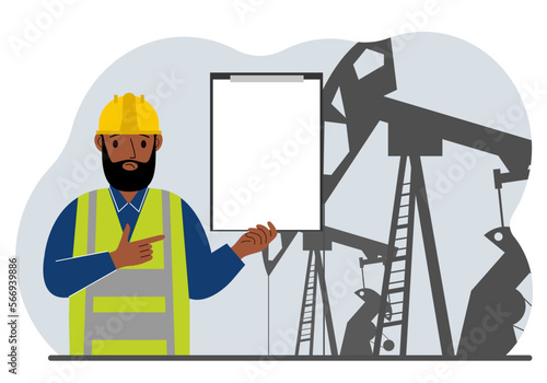 A male refinery engineer worker uses a tableted oil pumping unit. Energy industrial zone, oil drilling.