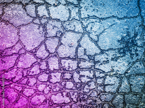 Old cracked asphalt, big blue and pink vector grunge background created by nature. Neon wallpapers. For screen, desktop, website design, overlay, stencil, stylization, design, polygraph. Gradient