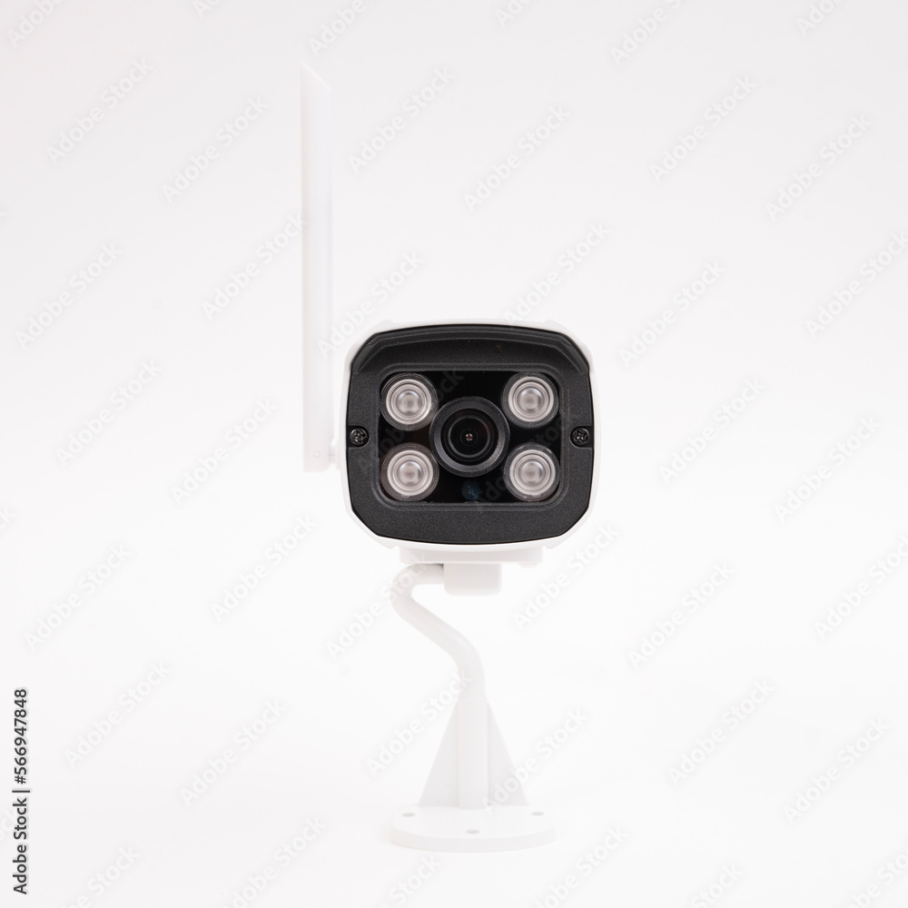 The surveillance camera is isolated on a white background. Street surveillance camera. Indoor surveillance camera. Video camera for the protection of order/ The surveillance camera is isolated on a white background. Street surveillance camera. Indoor surveillance camera. Video camera for the protection of order/