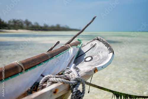 Sailing with a sail boat in Kenya, Zanzibar and in beautiful crystal Turquoise water on white sand tropical beach. Traditional fishing wooden boat in Diani Beach, Watamu and Zanzibar