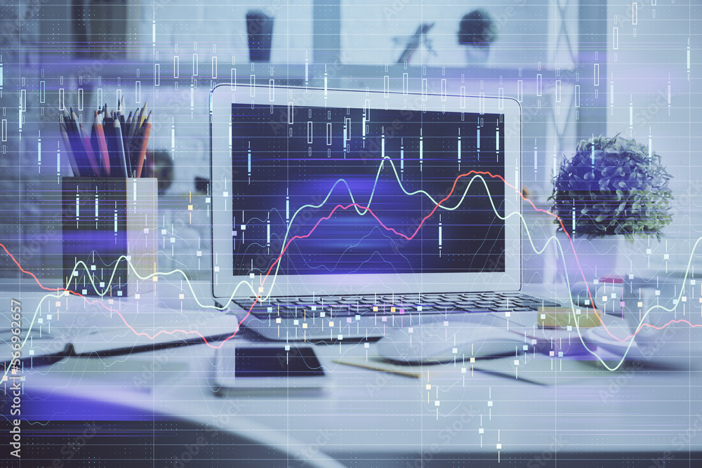 Financial market graph hologram and personal computer on background. Double exposure. Concept of forex.