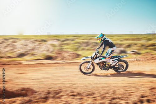 Fototapeta Naklejka Na Ścianę i Meble -  Motorbike, motorcross and speed on sand trail with power, sunshine and sports rally. Driver, motorcycle and man travel on dirt track, adventure course and action for freedom, performance and talent