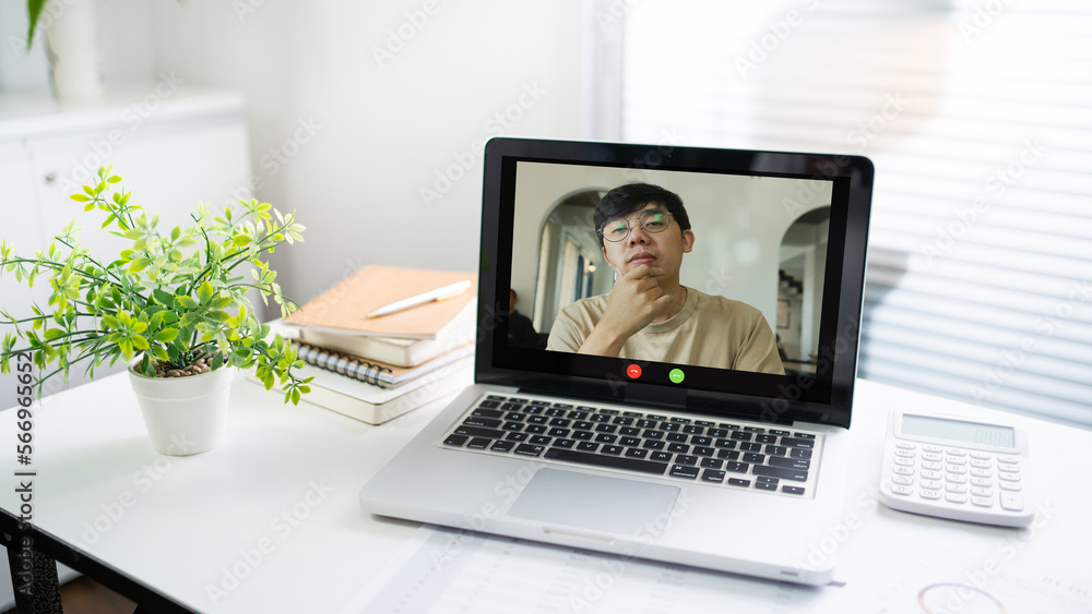 Fototapeta premium Laptop with Mock up blank screen on wooden table in front of cafe space for text. product display computer laptop montage- technology Freelance work concept