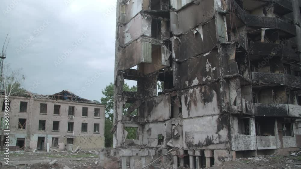 March, 2022. Borodianka, Ukraine. Standing burnt frames of abandoned buildings after the airstrikes. Horrific destructions of houses at main street of the village. High quality 4k footage March, 2022. Borodianka, Ukraine. Standing burnt frames of abandoned buildings after the airstrikes. Horrific destructions of houses at main street of the village. High quality 4k footage