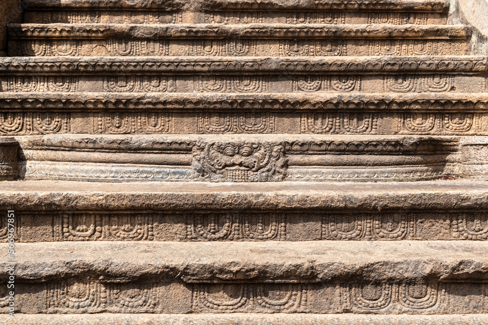 Beautiful ornamental carvings on the steps of the ancient Airavatesvara temple in Darasuram in Tamil Nadu.