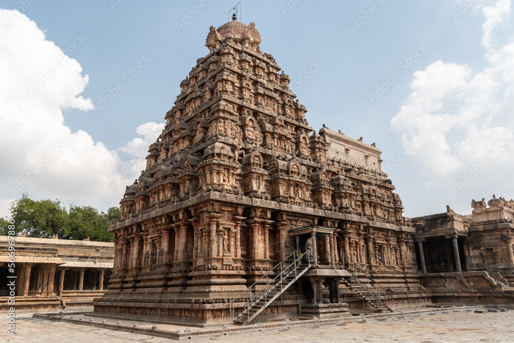 The gopuram tower of the ancient Airavatesvara temple in the village of Darasuram. The gopuram tower of the ancient Airavatesvara temple in the village of Darasuram.