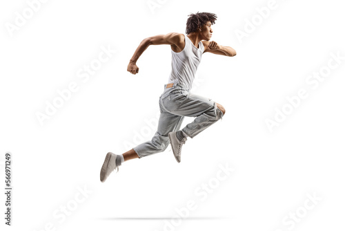 Full length profile shot of an african american male dancer jumping © Ljupco Smokovski
