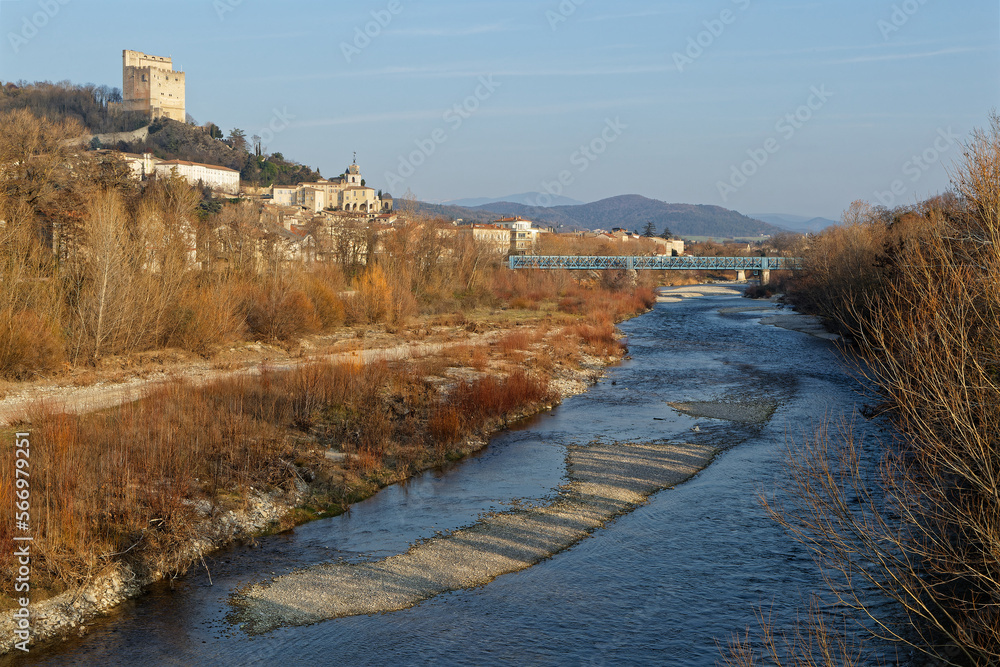 Drome river near the city of Crest with the Tower over the town