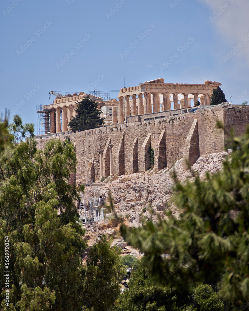 East view of Parthenon ancient temple on Acropolis of Athens hill. Cultural travel in Greece.