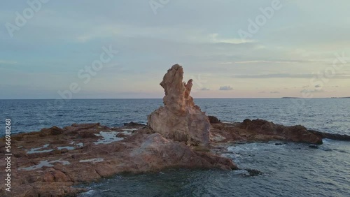 Reddish haven Cala pregonda Menorca Spain Mediterranean sea photo