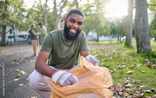 Canvas Print Black man, volunteer portrait and plastic bag for community park cleanup, recycling or cleaning