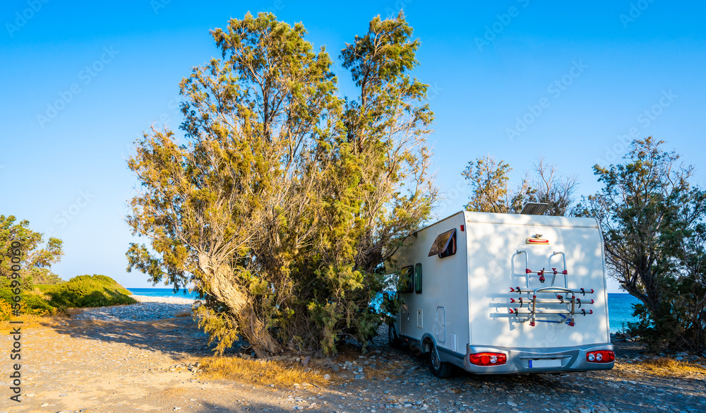 Motorhome parked on an amazing beach, Crete, Greece.