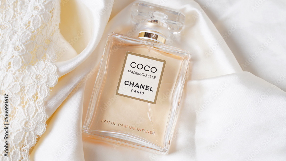 Netanya, Israel - 27 January, 2023 Coco Mademoiselle Chanel Paris worldwide  famous French perfume bottle on the white silk background Stock Photo