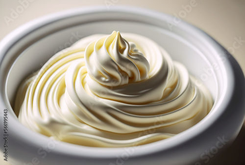top view of whipped sweet cream in white bowl