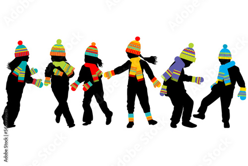 Children silhouettes having fun in winter cold weather clothing with colored scarves, hats and mittens