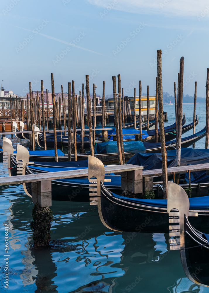 Gondolas docked by the lagoon in Venice, Italy