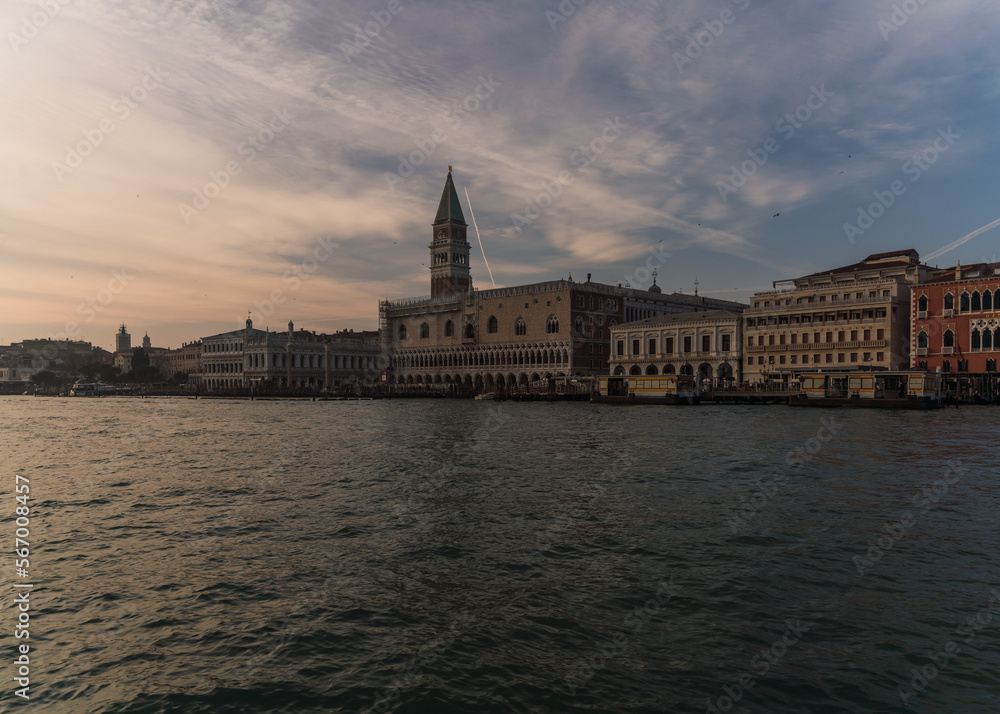 Sunset in Venice, Italy over the Giudecca canal with view of the Doge's Palace