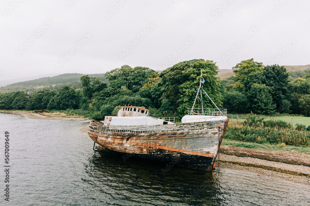The Old Boat of Caol at Corpach, Ben Nevis. The shipwreck, MV Dayspring washed up on the shore where Loch Linnhe meets Loch Eil.
