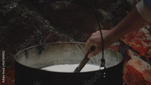 Process of Setting Milk Into Curd Over Fire, Cheese making, Chobareti Georgia photo