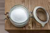 Granulated sugar in glass jar container - Jar full of sugar