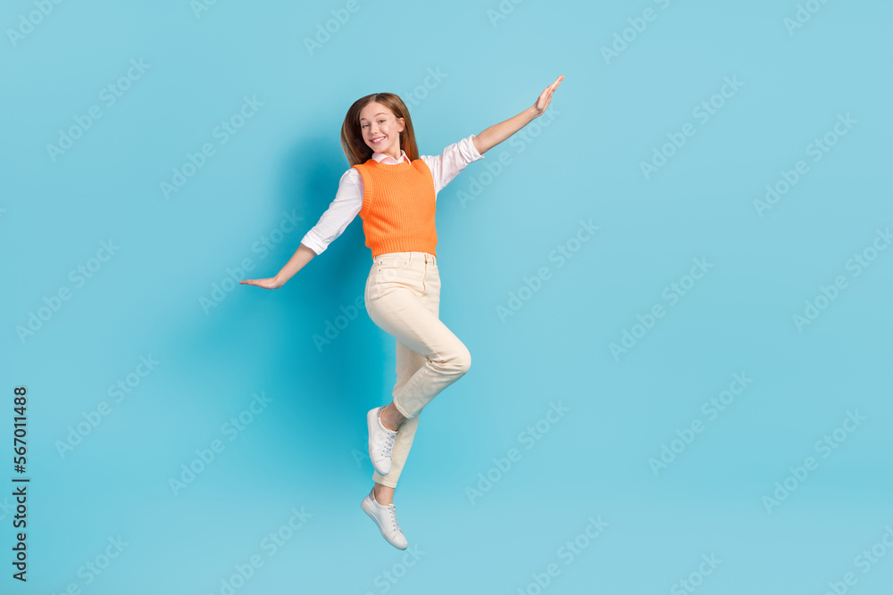 Full length photo of overjoyed lady wear stylish clothes rejoice summer holidays empty space isolated on blue color background