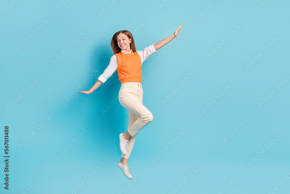 Obraz premium Full length photo of overjoyed lady wear stylish clothes rejoice summer holidays empty space isolated on blue color background