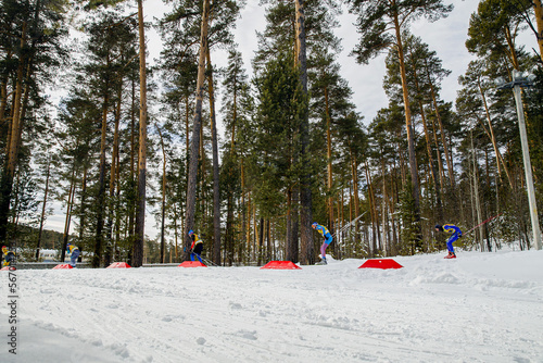 Russia, Zlatoust - March 17, 2019: group of skiers athletes run ski race 