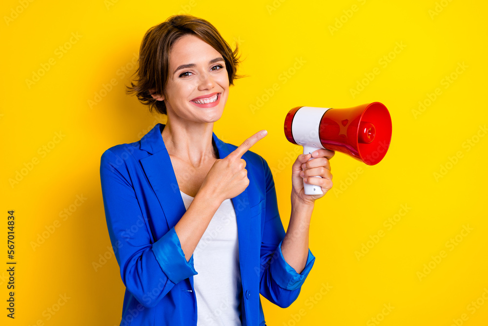 Photo of positive lady business agent speak discount offer point megaphone isolated on bright color background Photo of positive lady business agent speak discount offer point megaphone isolated on bright color background