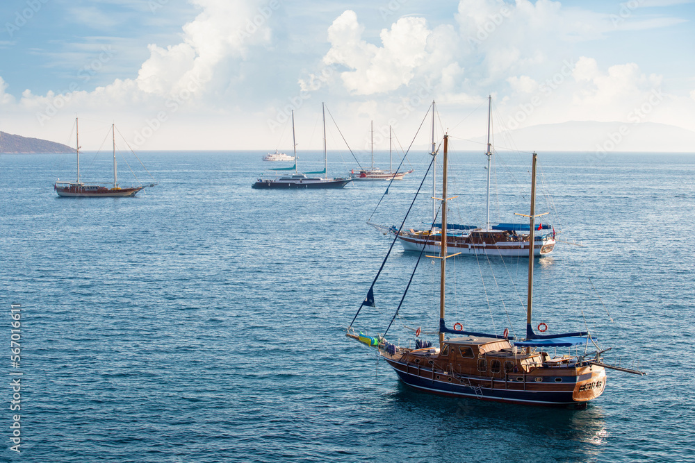 Beautiful view of yahts in Bodrum marina bay, Mugla province, Turkey. Concept of travel, summer vacation, holiday in Turkey.