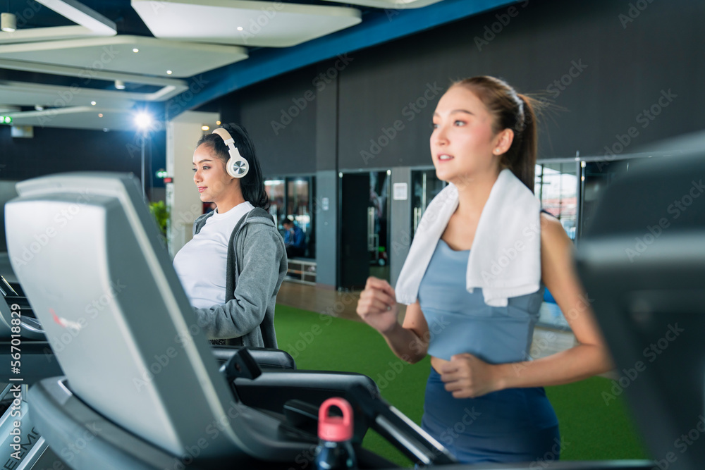 asian adult female sport woman jogger running on treadmill athletic working out active healthy lifestyle with cheerful freshness sweaty cardio exercise at fitness gym sport club morning wellness day asian adult female sport woman jogger running on treadmill athletic working out active healthy lifestyle with cheerful freshness sweaty cardio exercise at fitness gym sport club morning wellness day