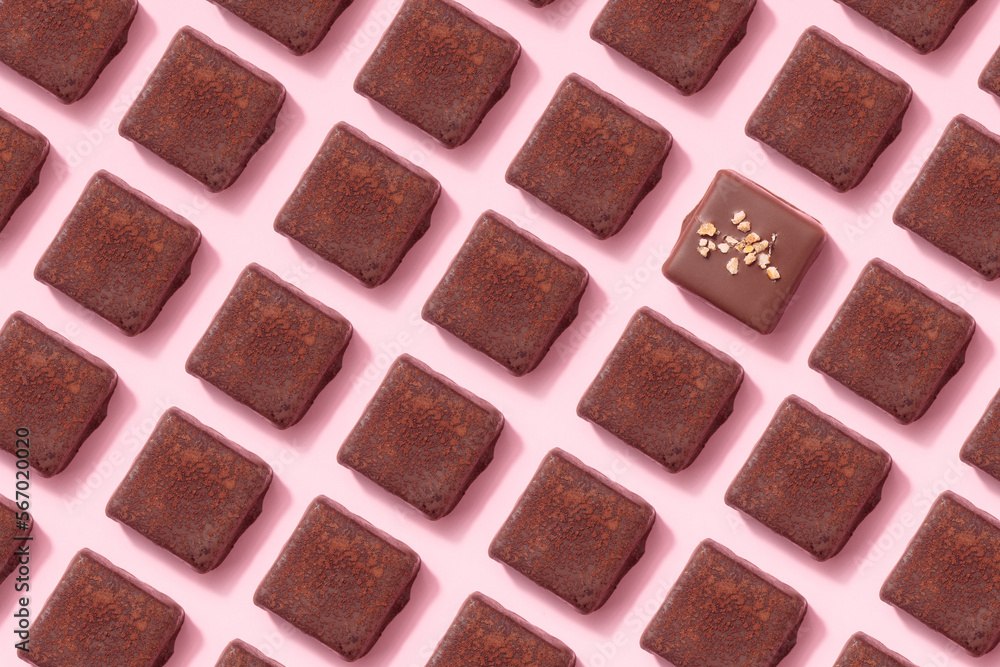 Fototapeta premium Handcrafted chocolate praline bonbons. Delicious dessert pattern